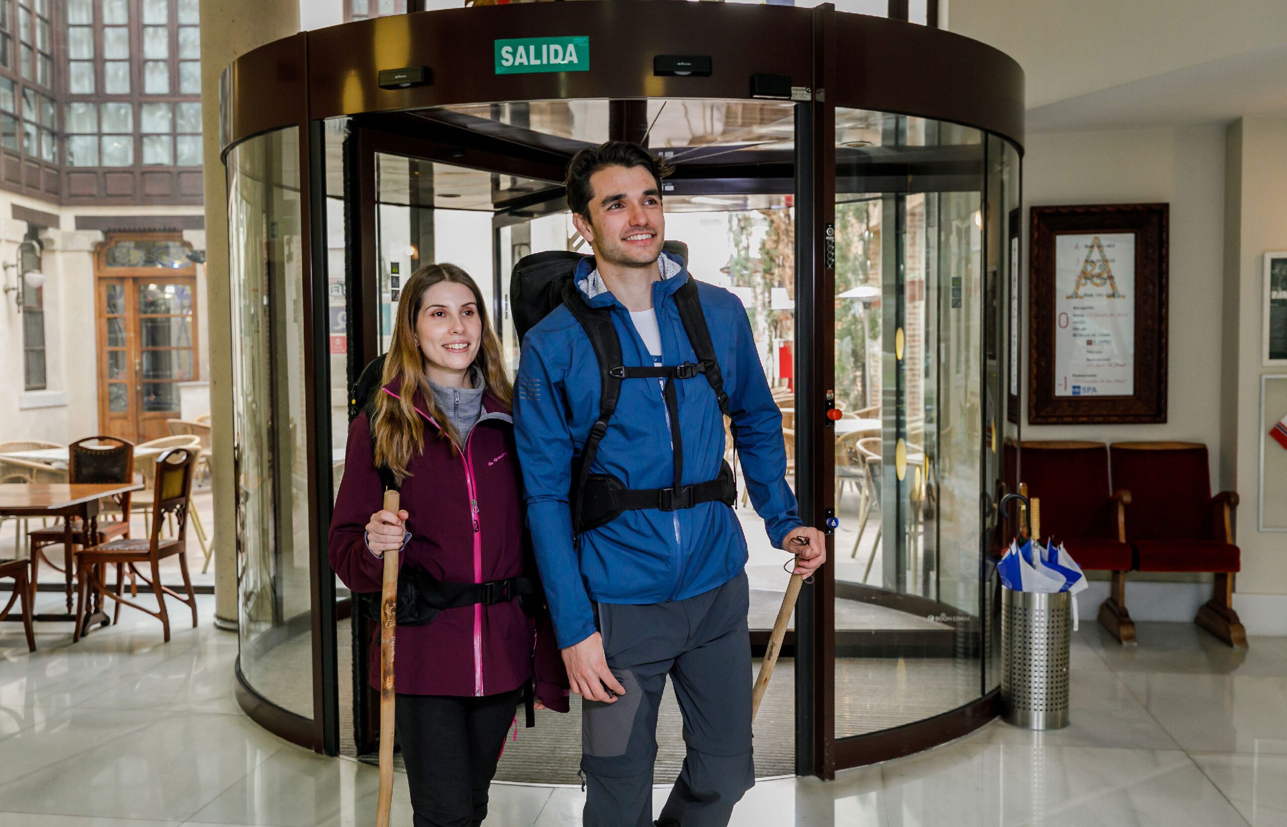 Pilgrims entering the Hotel Spa Ciudad de Astorga by PortBlue Boutique